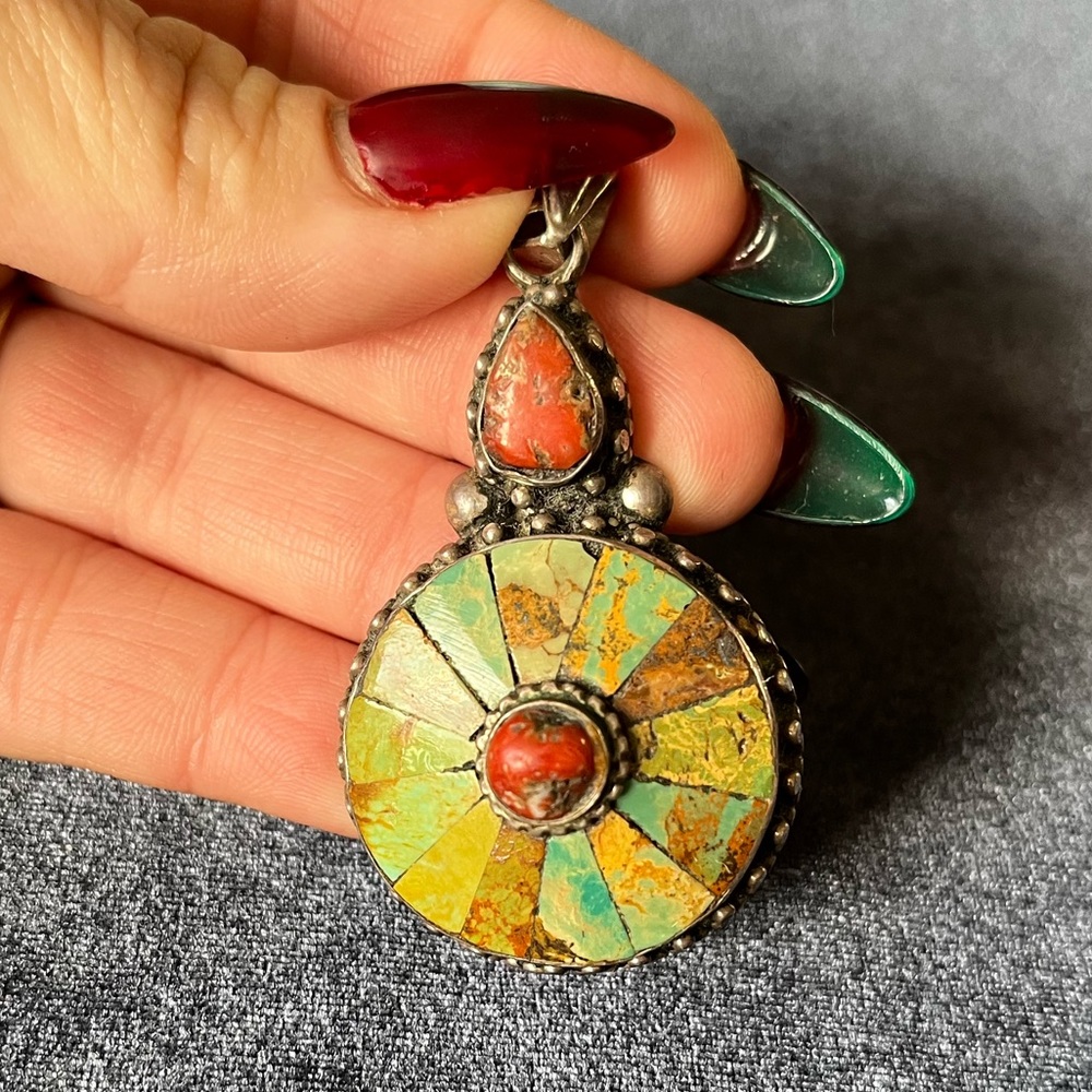 Intricate Silver real stone pendant
